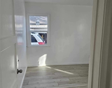 1310 W 89th Street - Photo Thumbnail 13