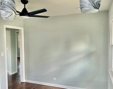8129 W Courtland Avenue - Photo Thumbnail 4
