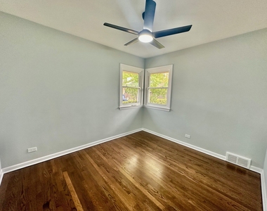 8129 W Courtland Avenue - Photo Thumbnail 6