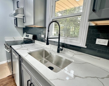 8129 W Courtland Avenue - Photo Thumbnail 3