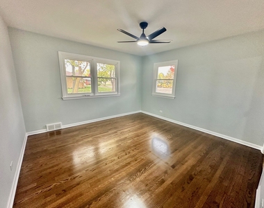 8129 W Courtland Avenue - Photo Thumbnail 5