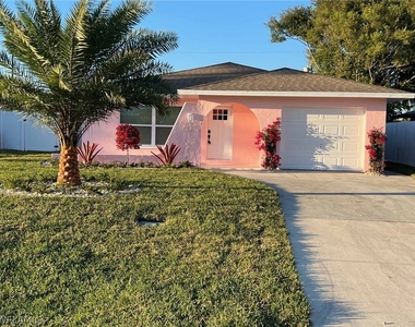 673 107th Avenue N - Photo Thumbnail 1