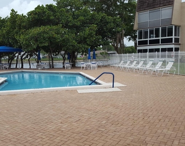 9301 Lime Bay Boulevard - Photo Thumbnail 3