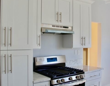 1239 S Hudson Avenue - Photo Thumbnail 6