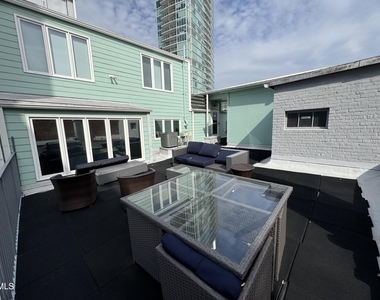 109 W Main Street - Photo Thumbnail 15