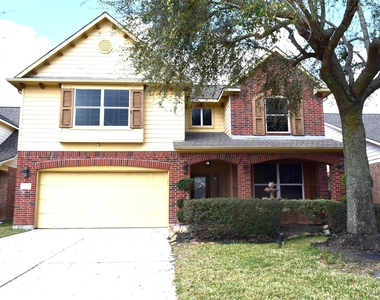 4911 Dwarf Honey Suckle Court - Photo Thumbnail 1