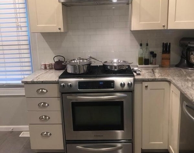 1004 Van Court Avenue - Photo Thumbnail 1