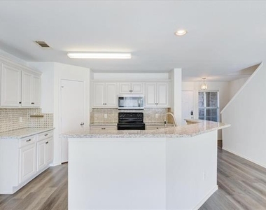 7405 Howling Coyote Lane - Photo Thumbnail 7