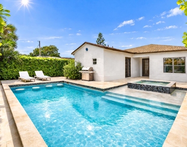 7606 S Olive Avenue - Photo Thumbnail 1