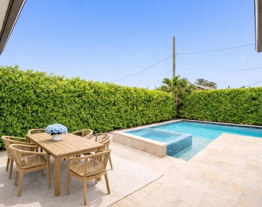7606 S Olive Avenue - Photo Thumbnail 2
