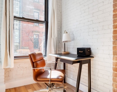 273 W 10th St - Photo Thumbnail 4