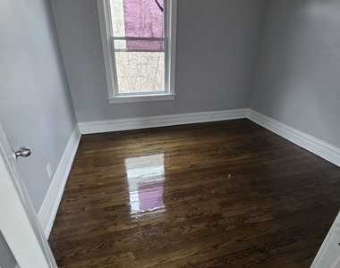 2704 E 77th Street - Photo Thumbnail 6