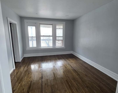 2704 E 77th Street - Photo Thumbnail 2