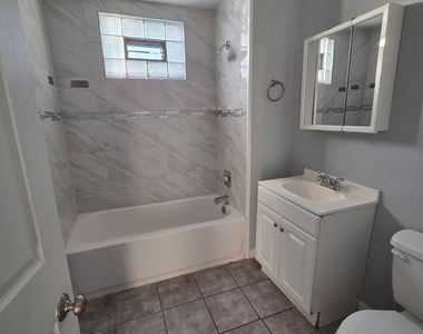 2704 E 77th Street - Photo Thumbnail 8