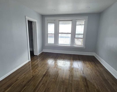 2704 E 77th Street - Photo Thumbnail 1