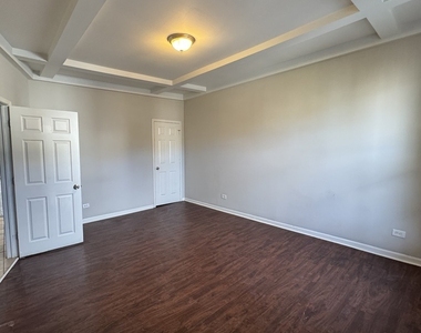 6130 S Rhodes Street - Photo Thumbnail 6