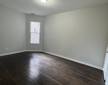 6130 S Rhodes Street - Photo Thumbnail 5