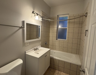 6130 S Rhodes Street - Photo Thumbnail 7
