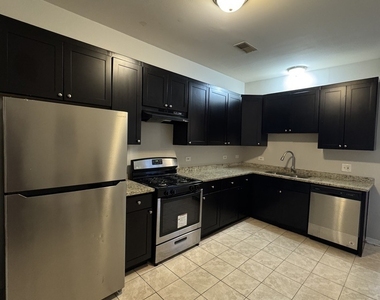 6130 S Rhodes Street - Photo Thumbnail 8