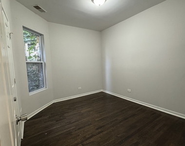 6130 S Rhodes Street - Photo Thumbnail 4
