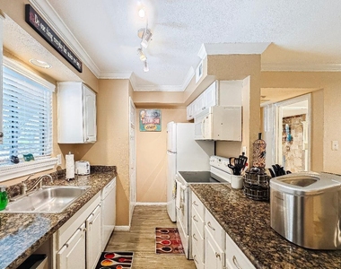 12100 Melville Dr - Photo Thumbnail 11