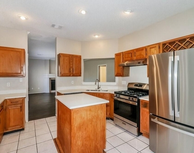 6018 Fern Hollow Court - Photo Thumbnail 4