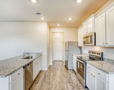 8219 Blooming Meadow Lane - Photo Thumbnail 5