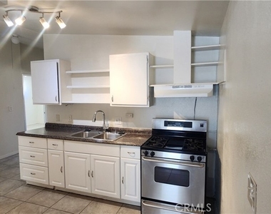 6963 Tamarisk Avenue - Photo Thumbnail 2
