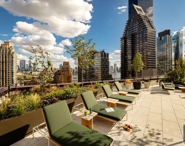 East 50 Street - Photo Thumbnail 17