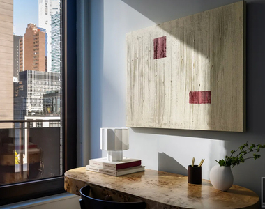 East 50 Street - Photo Thumbnail 6