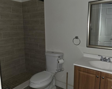 6031 Scotchwood Glen - Photo Thumbnail 6
