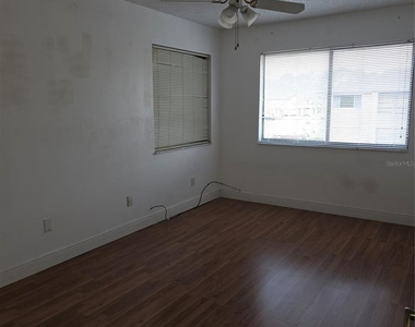 6031 Scotchwood Glen - Photo Thumbnail 2