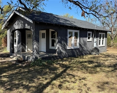 705 E 9th Street - Photo Thumbnail 1