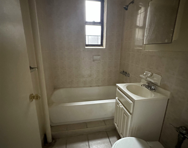 61-25 Woodside Avenue - Photo Thumbnail 3
