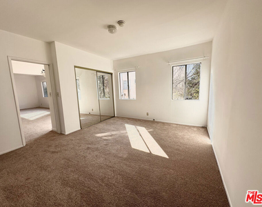 6069 1/2 Cashio Street - Photo Thumbnail 6