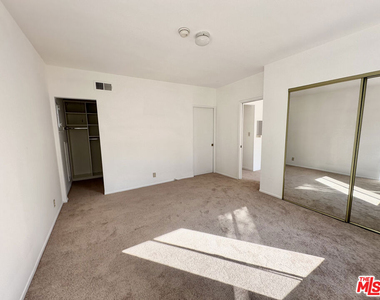 6069 1/2 Cashio Street - Photo Thumbnail 7
