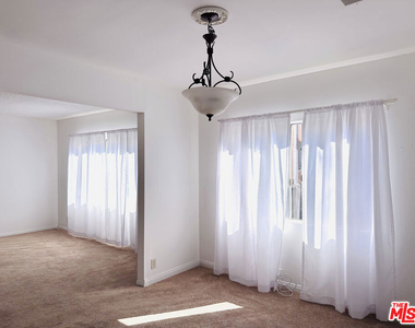 6069 1/2 Cashio Street - Photo Thumbnail 4