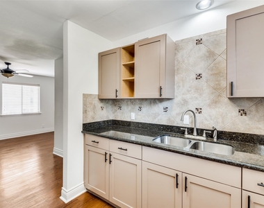 5612 Grover Avenue - Photo Thumbnail 2