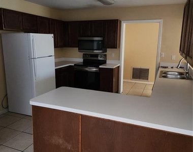 8748 Hampden Drive - Photo Thumbnail 3