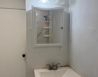 1116 W 32nd Street - Photo Thumbnail 7