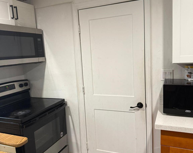 1116 W 32nd Street - Photo Thumbnail 2