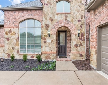 9609 Sam Bass Trail - Photo Thumbnail 1