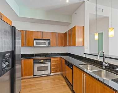1551 N Flagler Drive - Photo Thumbnail 4