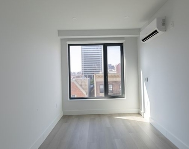 215 East 124th Street - Photo Thumbnail 4