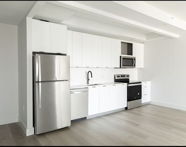 215 East 124th Street - Photo Thumbnail 2