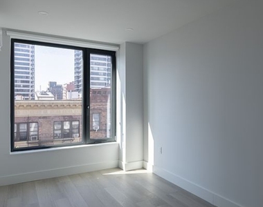 215 East 124th Street - Photo Thumbnail 3