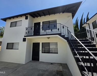 12246 Oxnard Street - Photo Thumbnail 2