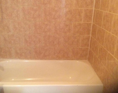 5831 Quantrell Avenue - Photo Thumbnail 4