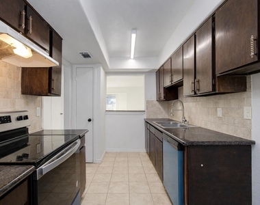 7902 Grove Ridge Drive - Photo Thumbnail 3