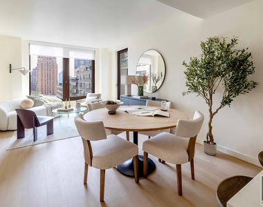East 50 Street - Photo Thumbnail 1